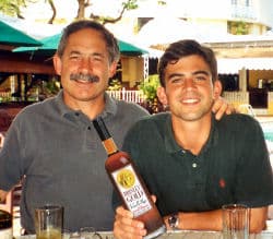 G. Robert and G. Zachary Brinley showing off their rum.